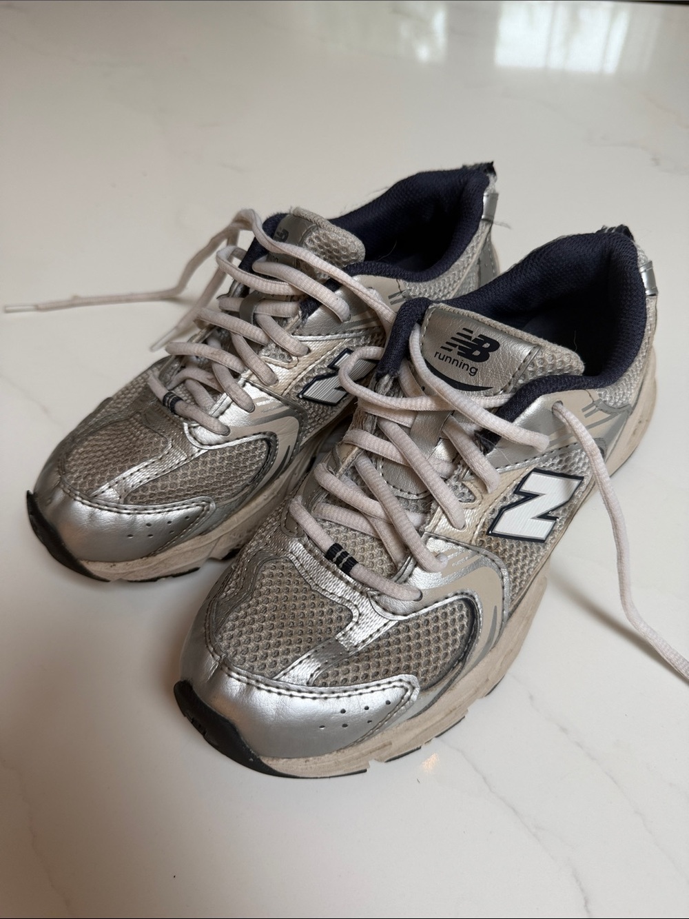 New Balance Kids Silver and Navy Athletic Sneakers